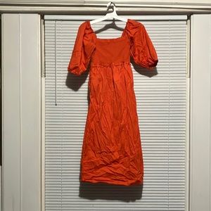 Vivid reddish orange dress